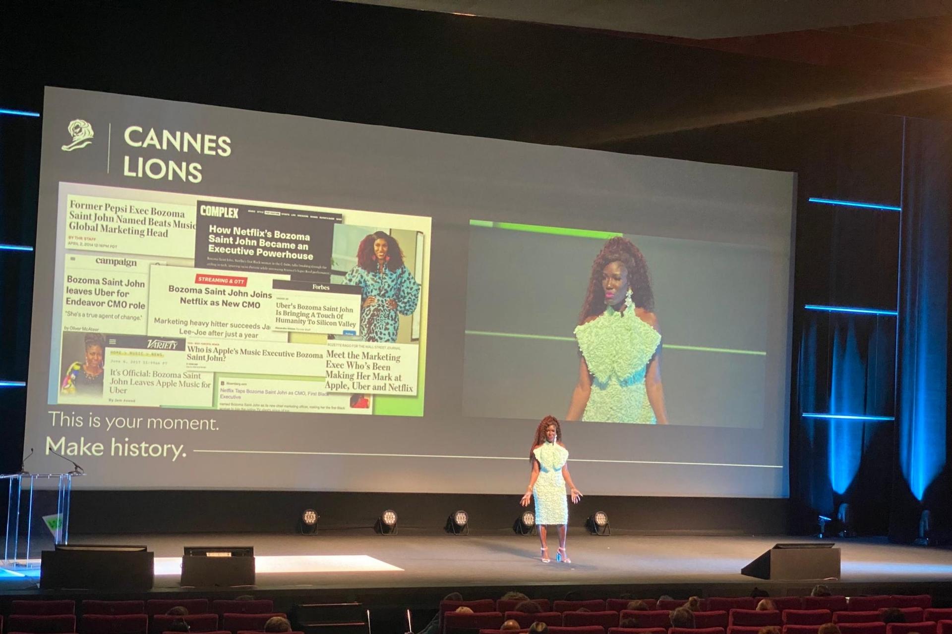 On a theater stage, the same woman in a mint-green ruffled dress appears alongside projected slides referencing multiple media headlines, with the words “Cannes Lions” visible.