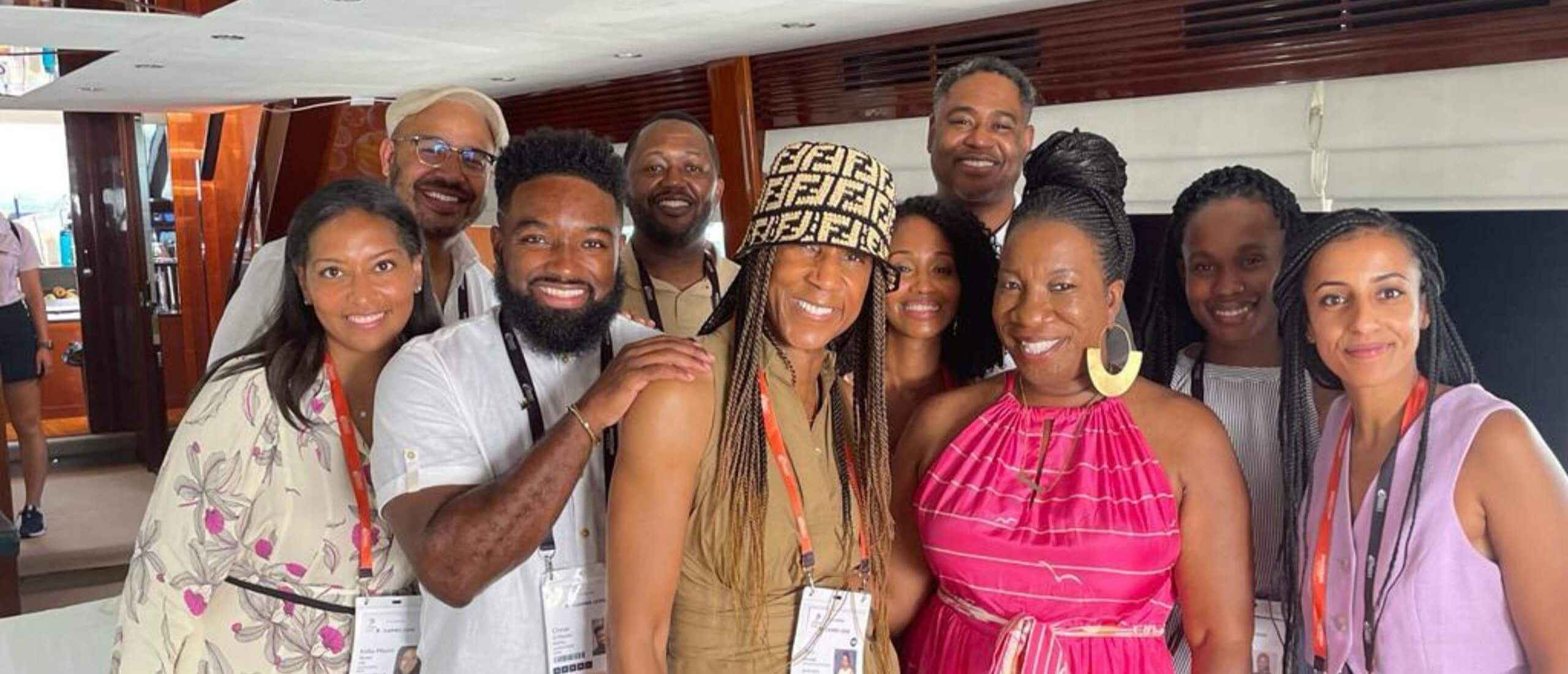 Jerri DeVard & Future Leaders posing for a photo with Tarana Burque