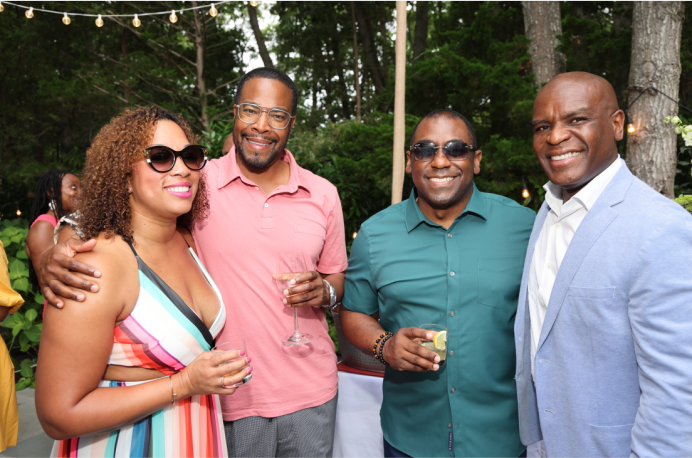 Group image of BECA members at an event