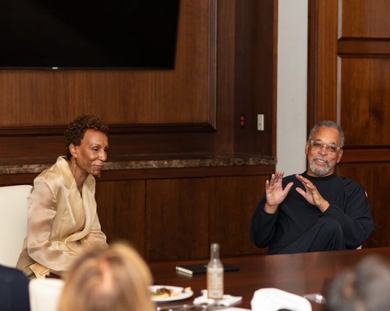 Jerri DeVard and Bruce S. Gordon talking to BECA Members at the October 2024 Member Meeting.
